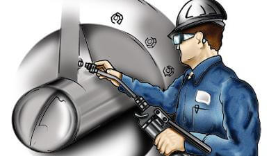Maintenance engineer inspecting grease on a machine
